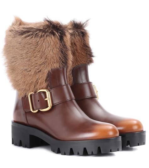 ugg prada|expensive fur trimmed boots.